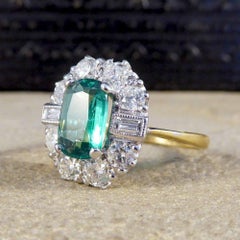 1 Carat Emerald and Diamond Cluster Engagement Ring