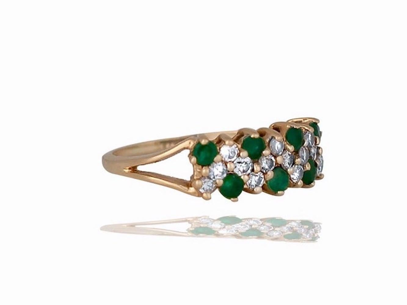 Jewel Green Colored Emeralds and diamonds are set in this ring containing 1.00 carat total weight. 
This ring has seven round brilliant emeralds that are prong set and thirteen round brilliant diamonds that measure between 2.5 -2.0 mm 

The round