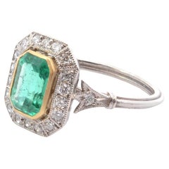 Vintage 1 carat emerald and diamonds ring