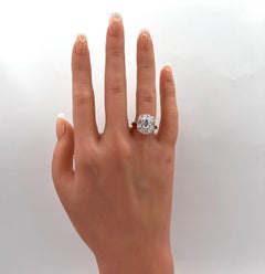 1 Carat Emerald and Round Diamond Ring in 18K White Gold