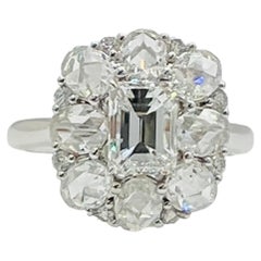 1 Carat Emerald and Round Diamond Ring in 18K White Gold