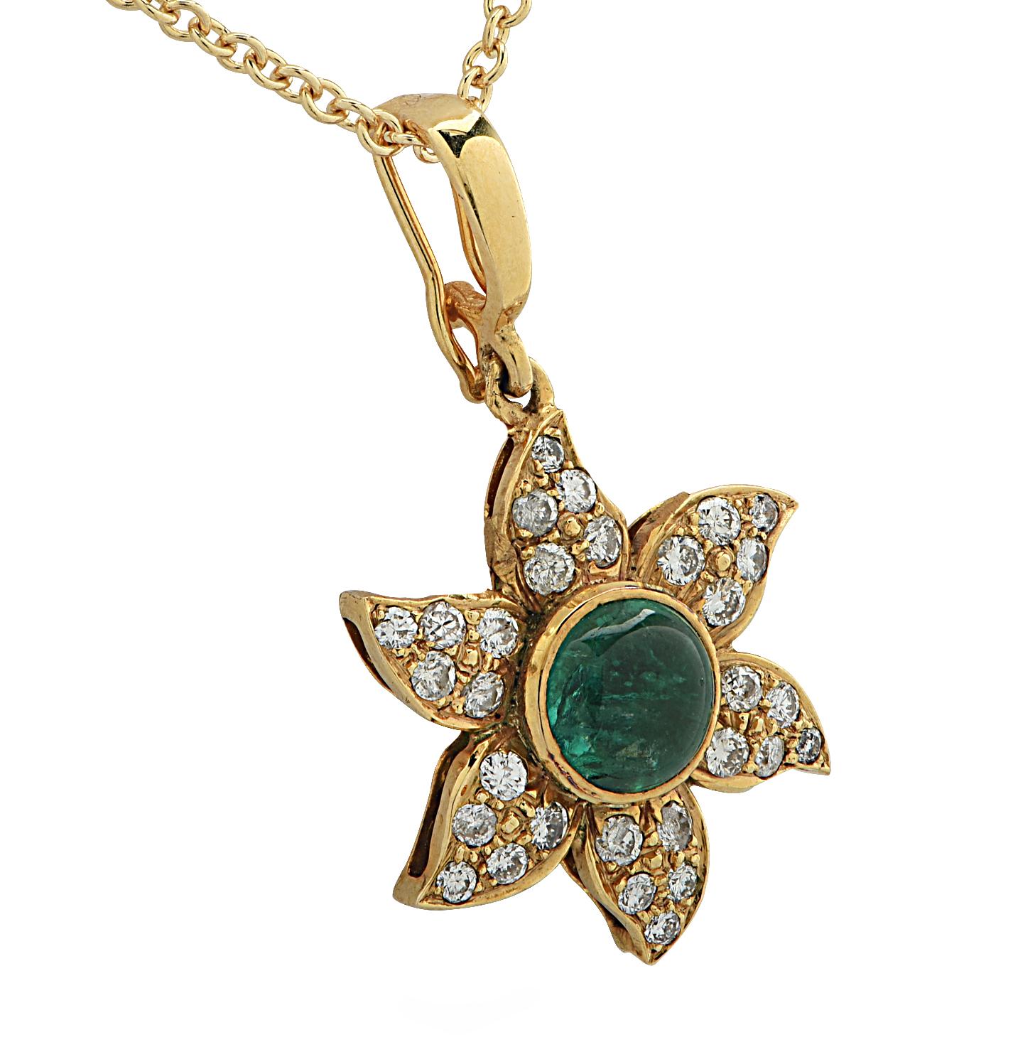 Stunning necklace and pendant crafted in 18 Karat Yellow gold, showcasing a cabochon emerald weighing approximately one carat surrounded by 30 round brilliant cut diamonds weighing approximately .45 carats G color, SI clarity. The gorgeous emerald &