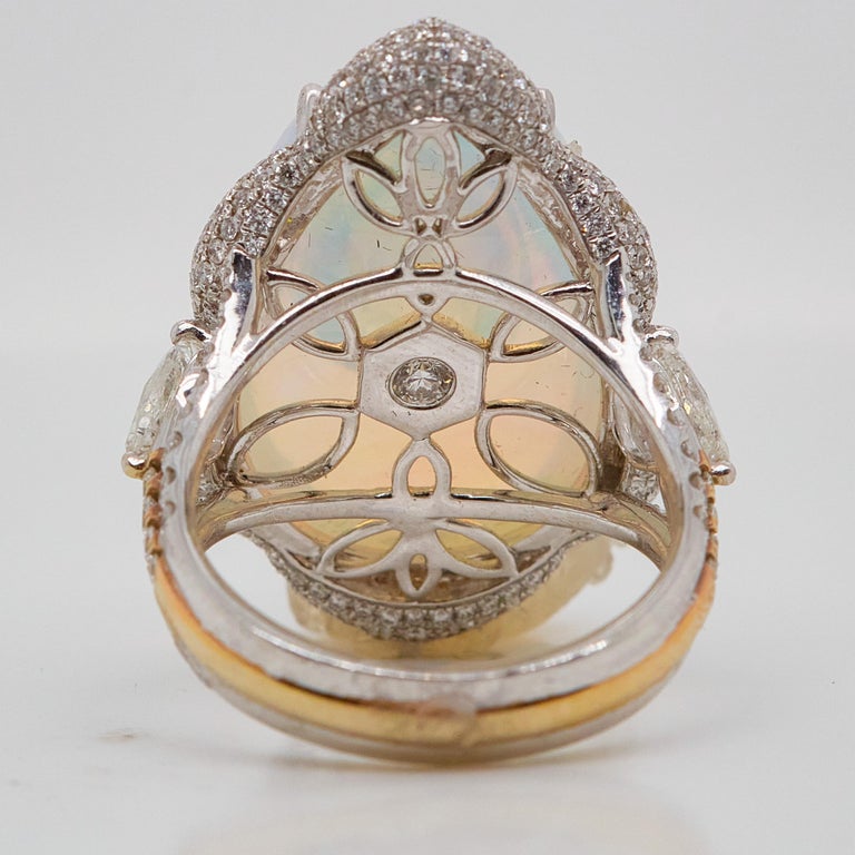 1 Carat Fancy Vivid OrangeyYellow Diamond and Opal Cocktail Ring, GIA