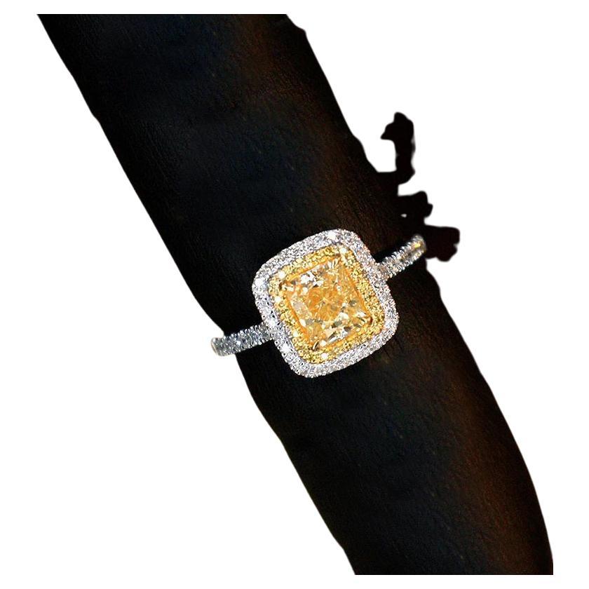 1 Ct Fancy Yellow Diamond Ring 18k White Gold with over 50 diamonds on too

Chose from a split band or single .

For yellow, in particular, the diamonds get this color from the presence of nitrogen molecules during the forming process. These