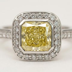 1 Carat Fancy Yellow Radiant Cut Diamond Halo Platinum Engagement Ring