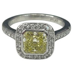 1 Carat Fancy Yellow Radiant Cut Diamond Halo Platinum Engagement Ring