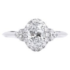 GIA Report Certified 1 Carat E VS Oval Cut Diamond Engagement Ring in 18k white 
