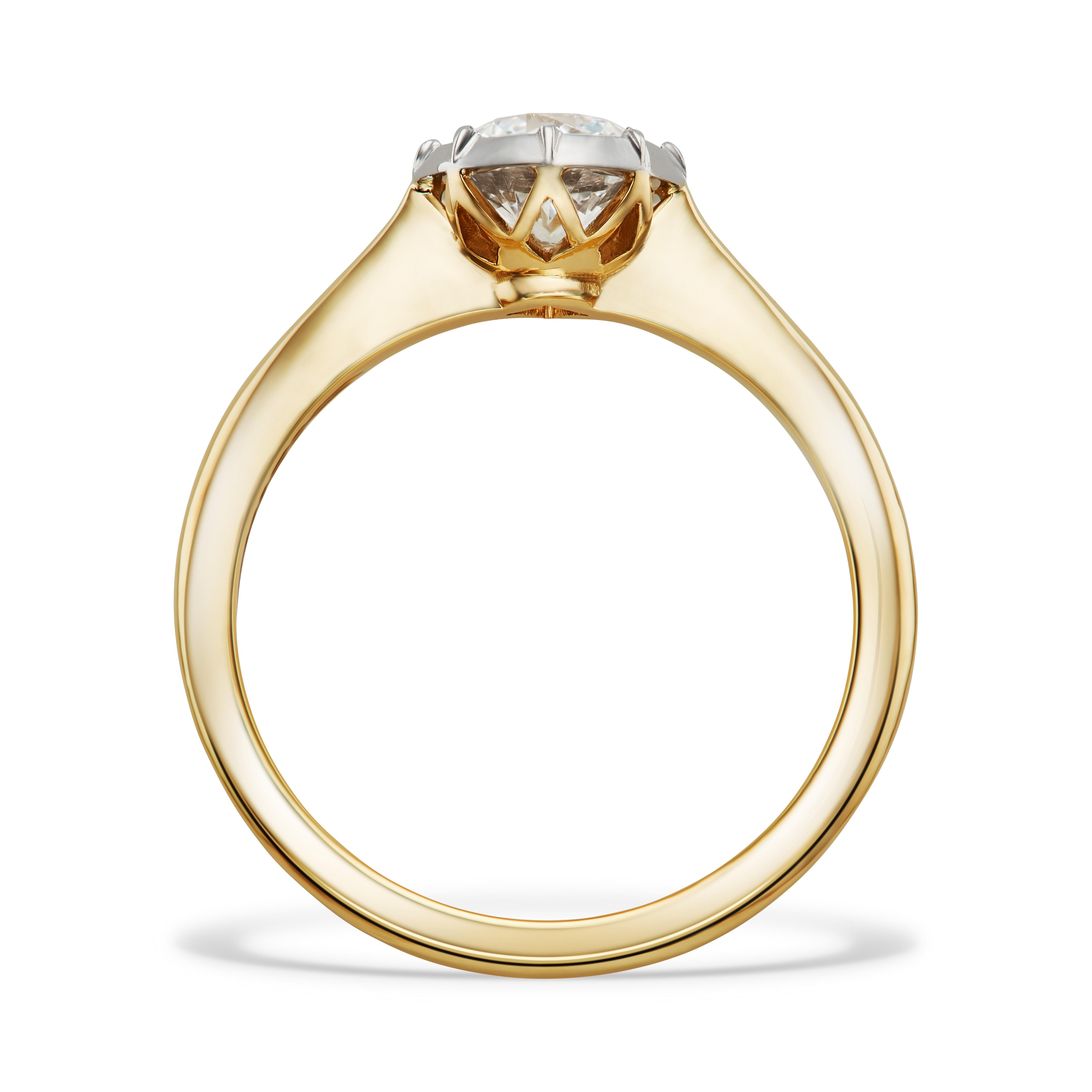 With a stunning round old cut diamond traditionally set by hand in a 