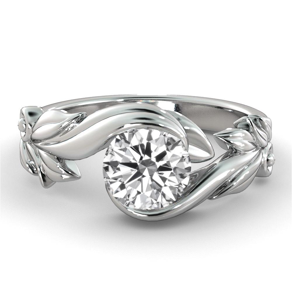 Unique vine leaf style setting GIA certified diamond engagement ring. Ring features a 1 carat round cut 100% eye clean natural diamond of F-G color and VS2-SI1 clarity. Set in a sleek, 18K white gold, solitaire ring with a 4-prong setting. The