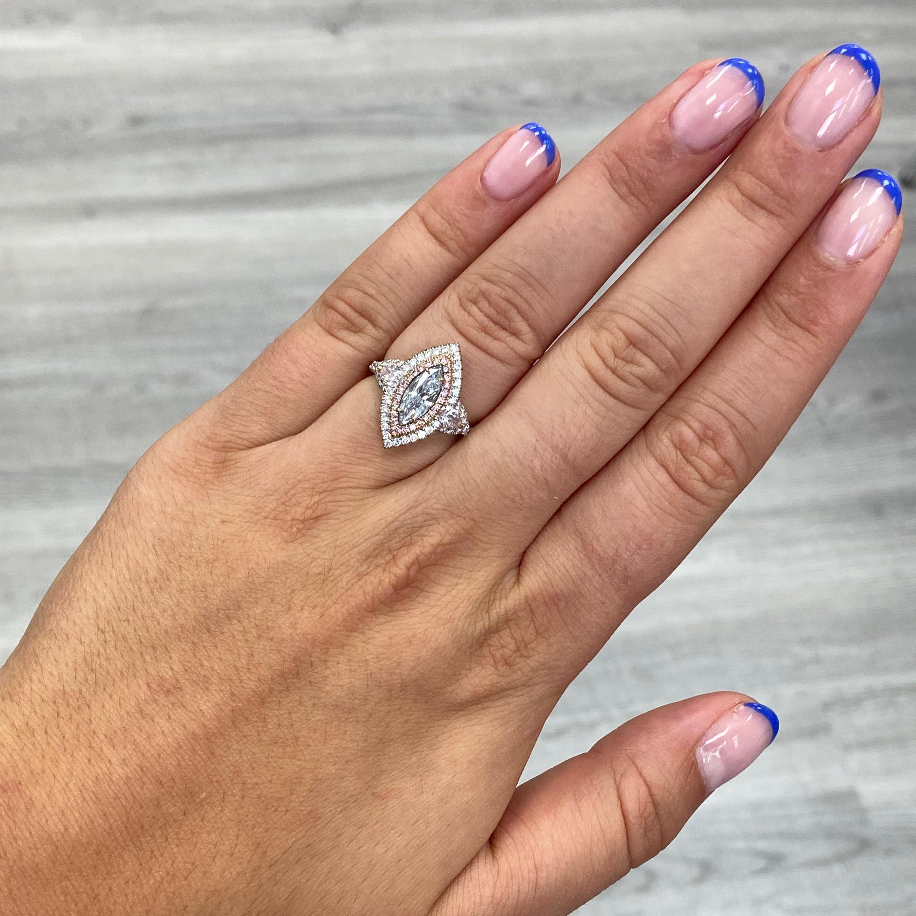 - 1.01 Carat GIA Light Blue Marquise
- SI2 Clarity 
- .37 Carats Pear Pink (Side Stones)
- .12 Carats of Pink Rounds
- .45 Carats of White Rounds
- Total weight 1.95 Carats
- Handmade in NYC
- Size 6.5

Making Extraordinary Attainable with Rare
