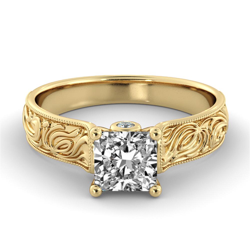 This breathtaking hand engraved vintage style ring features a solitaire GIA certified diamond. Ring features a 1 carat princess cut 100% eye clean natural diamond of F-G color and VS2-SI1 clarity accompanied by 2 smaller natural diamonds off approx.