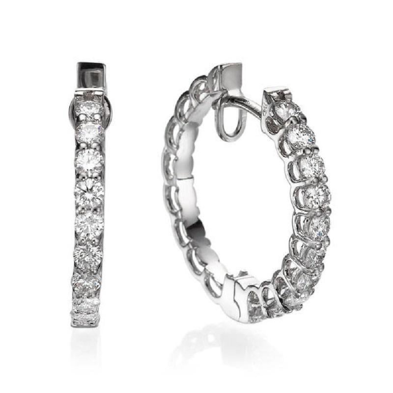 A handmade Diamond hoop earrings made of 18K White Gold set with 20 Diamonds . The total carat weight of these beautiful eiamond drop earrings is 1.00 carat.
 
 Item Specs:
 Color: F-G 
 Clarity: VS-SI 
 
 Main Stone: 
 These dangle earrings can be