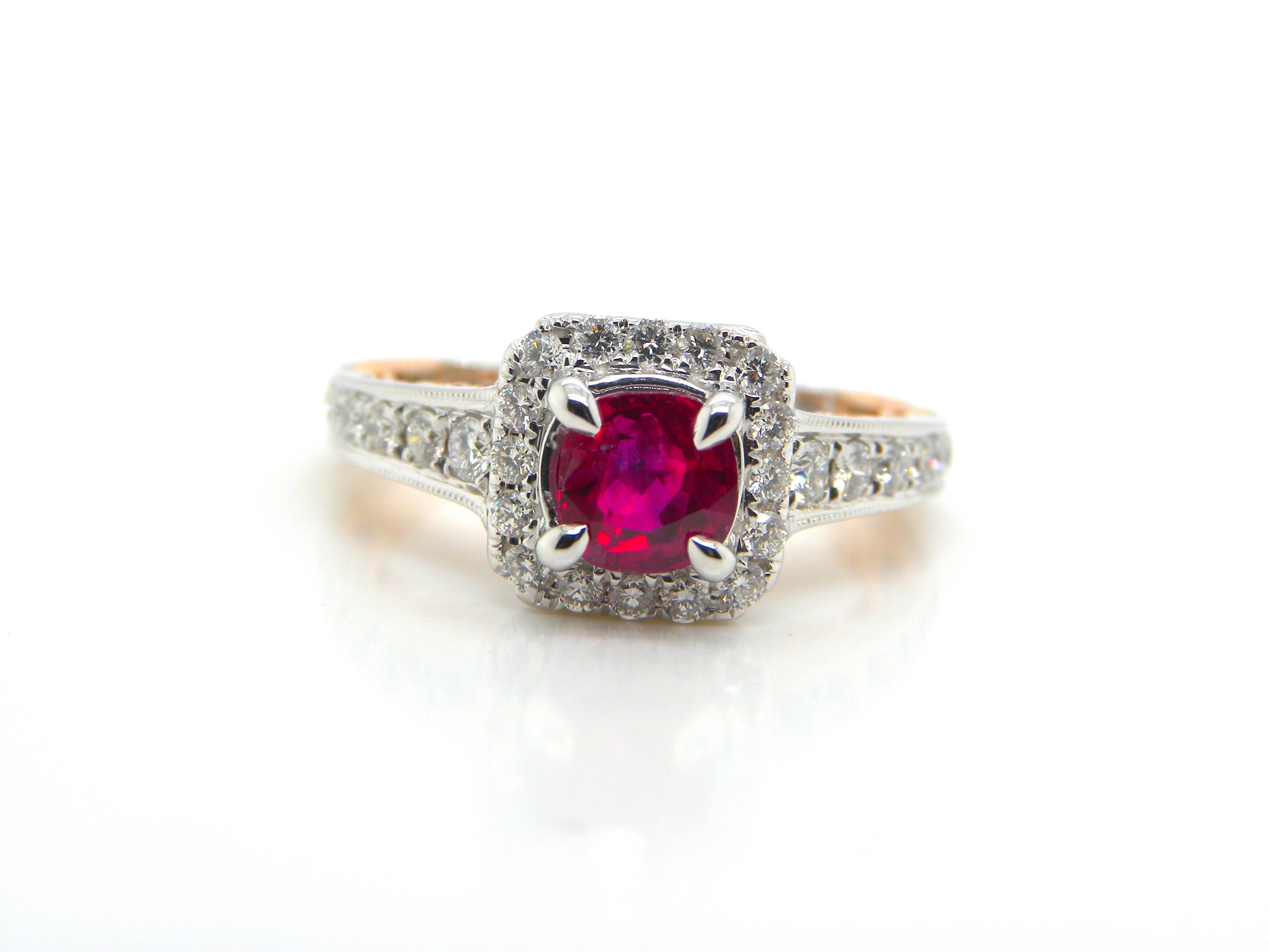 1 Carat LOTUS Certified Burma No Heat Pigeon's Blood Red Ruby and Diamond Ring:

A gorgeous ring, it features an unheated Burmese pigeon's blood red ruby weighing 1 carat, surrounded by white round brilliant diamonds extending upto the ring shank