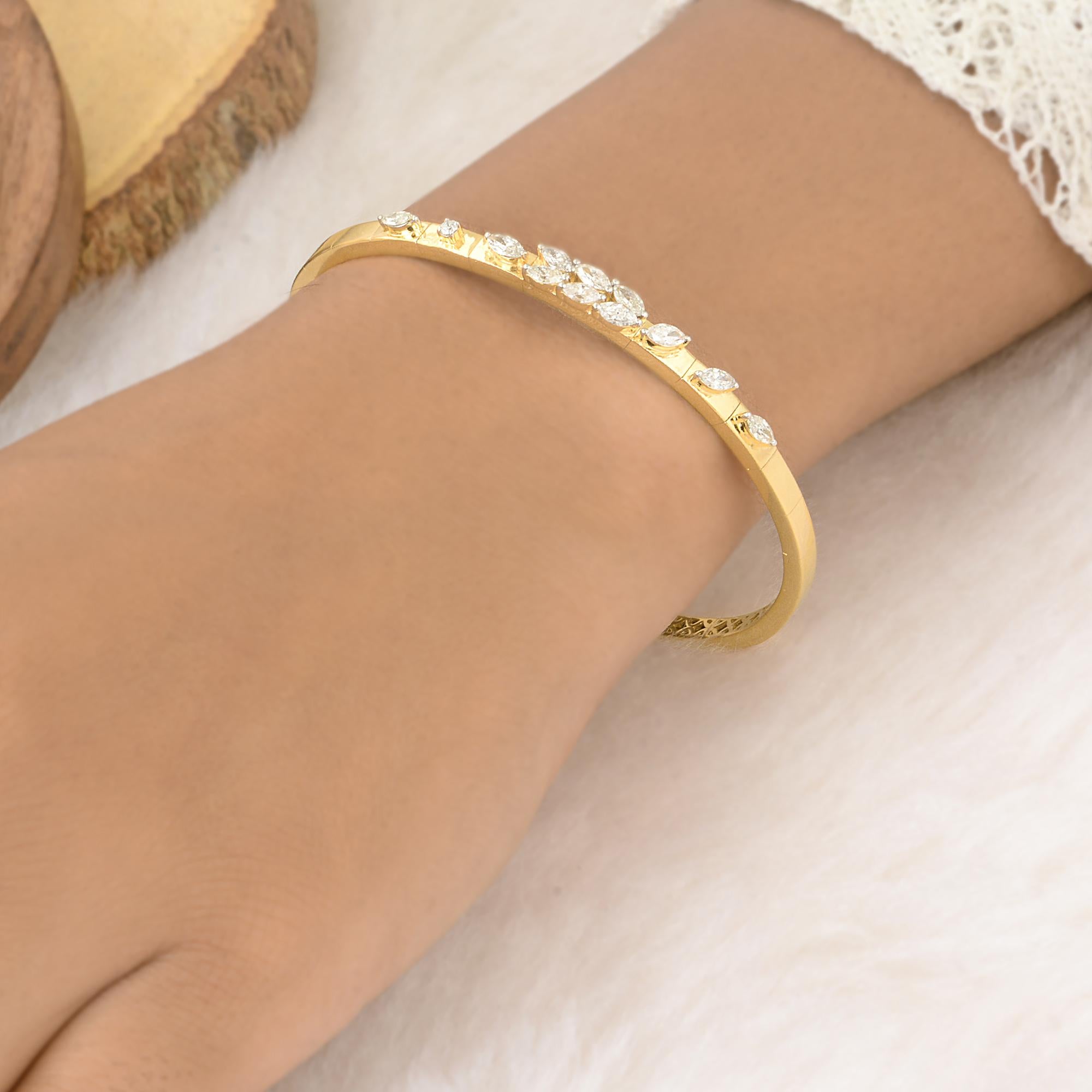 Item Code :- SEB-6143
Gross Weight :- 13.95 gm
18k Yellow Gold Weight :- 13.75 gm
Natural Diamond Weight :- 1 Carat  ( AVERAGE DIAMOND CLARITY SI1-SI2 & COLOR H-I )
Bangle Length :- 60 mm approx.

✦ Sizing
.....................
We can adjust most