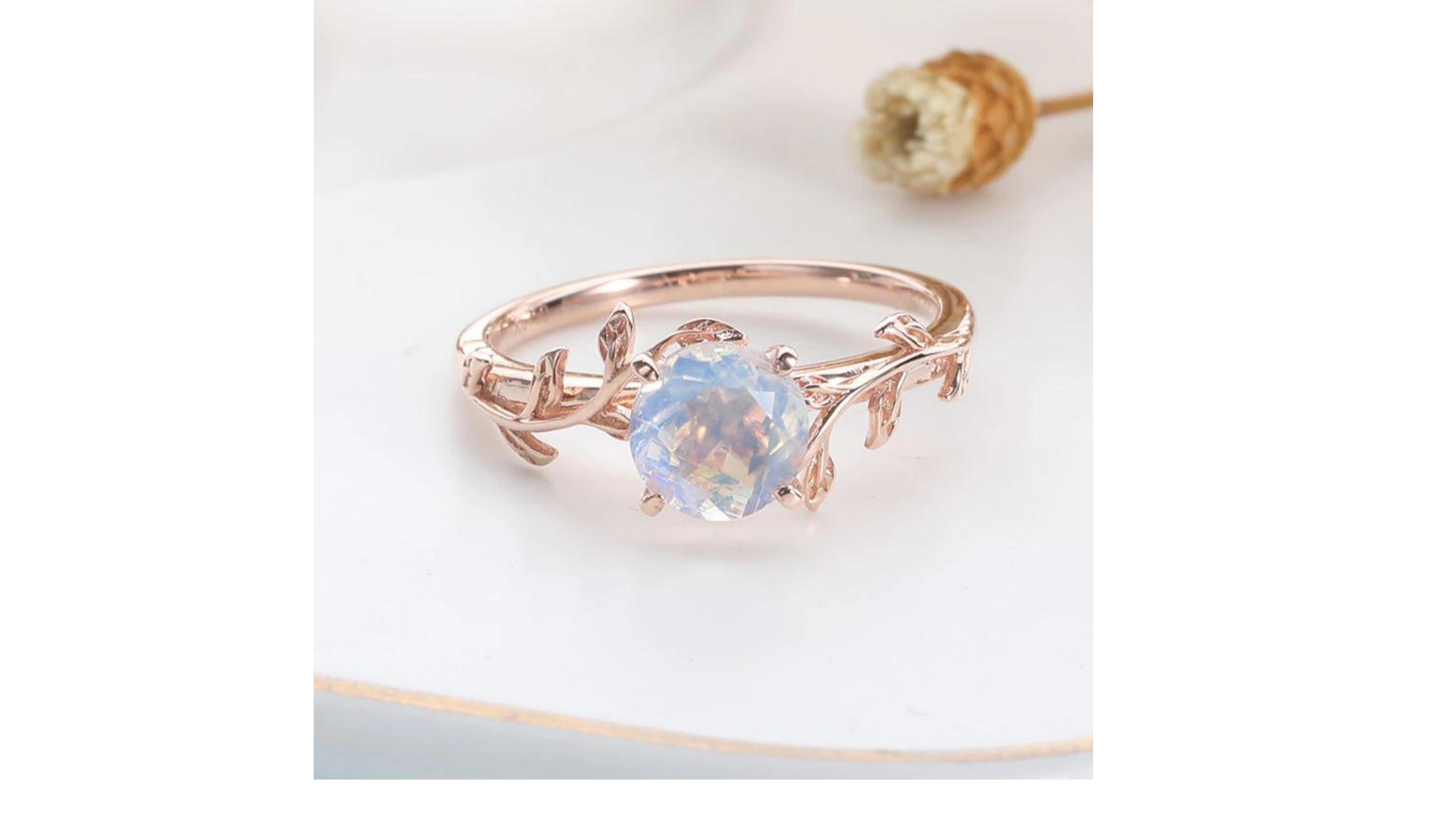 

Unique 1 Carat Moonstone ring set in 14 Karat Rose Gold which shows of flashes of color  and a blue hue .  You can have this in White Gold too. 
If you are looking for anything specific let us know


Moonstone is the second in our trio of articles