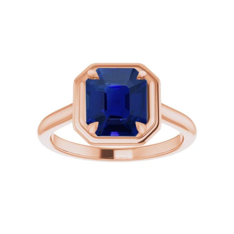 A modern and elegant ring by Gem + Honey, set with a fine quality, vivid blue, rectangular, step-cut natural, unheated sapphire from the coveted region of Burma (Myanmar) set in a contemporary 18kt rose gold ring. The blue sapphire accompanies a