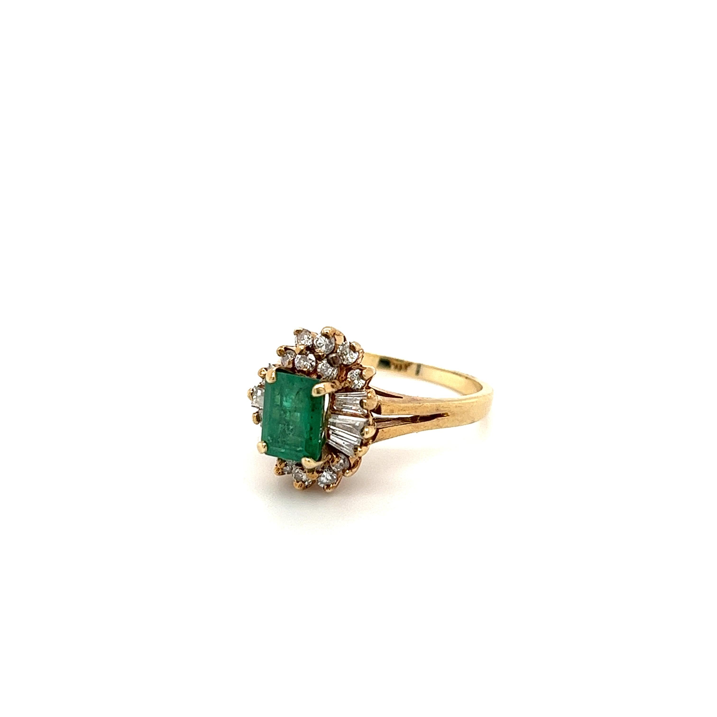emerald ring with diamond halo