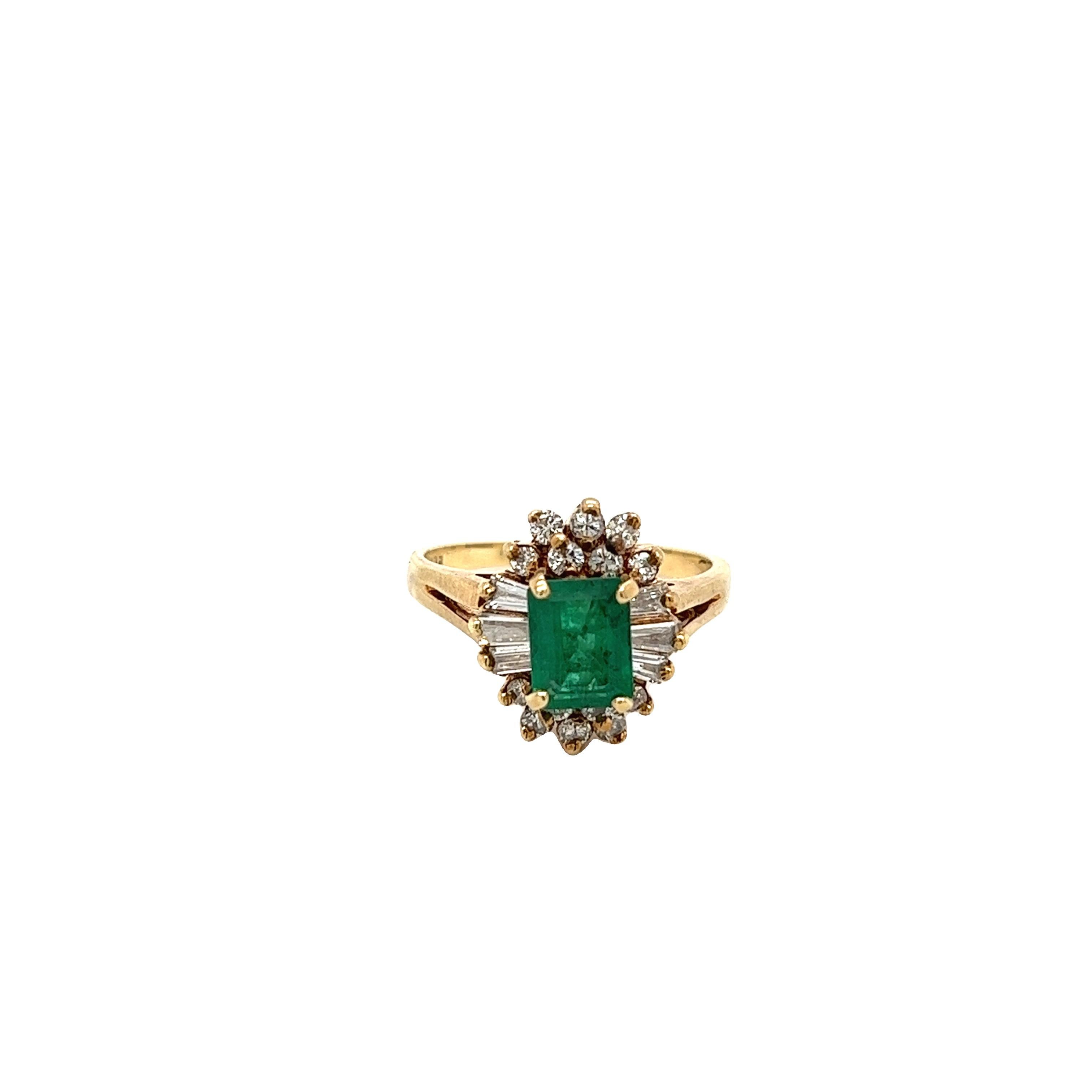 emerald ring with diamond baguettes