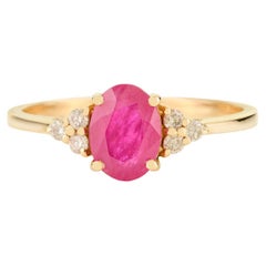 Bague en or jaune 14 carats ornée d'un rubis naturel de taille ovale et d'un diamant Bijoux fins