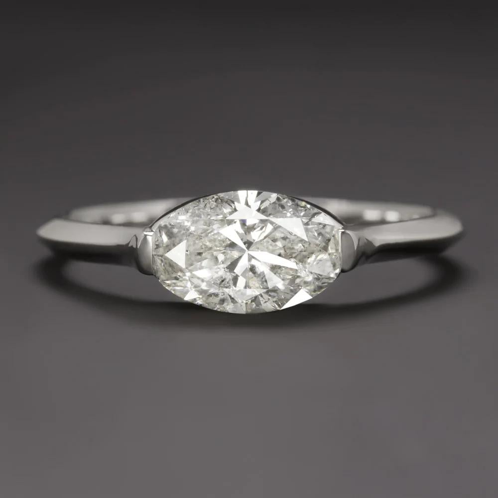 1 Carat Oval Diamond East West White Engagement Gold Ring

This amazing ring features a bright 1 carat oval diamond, the setting is made in solid 14K white gold.
Thew diamond is set east-west in a solitaire mounting; this is a perfect engagement