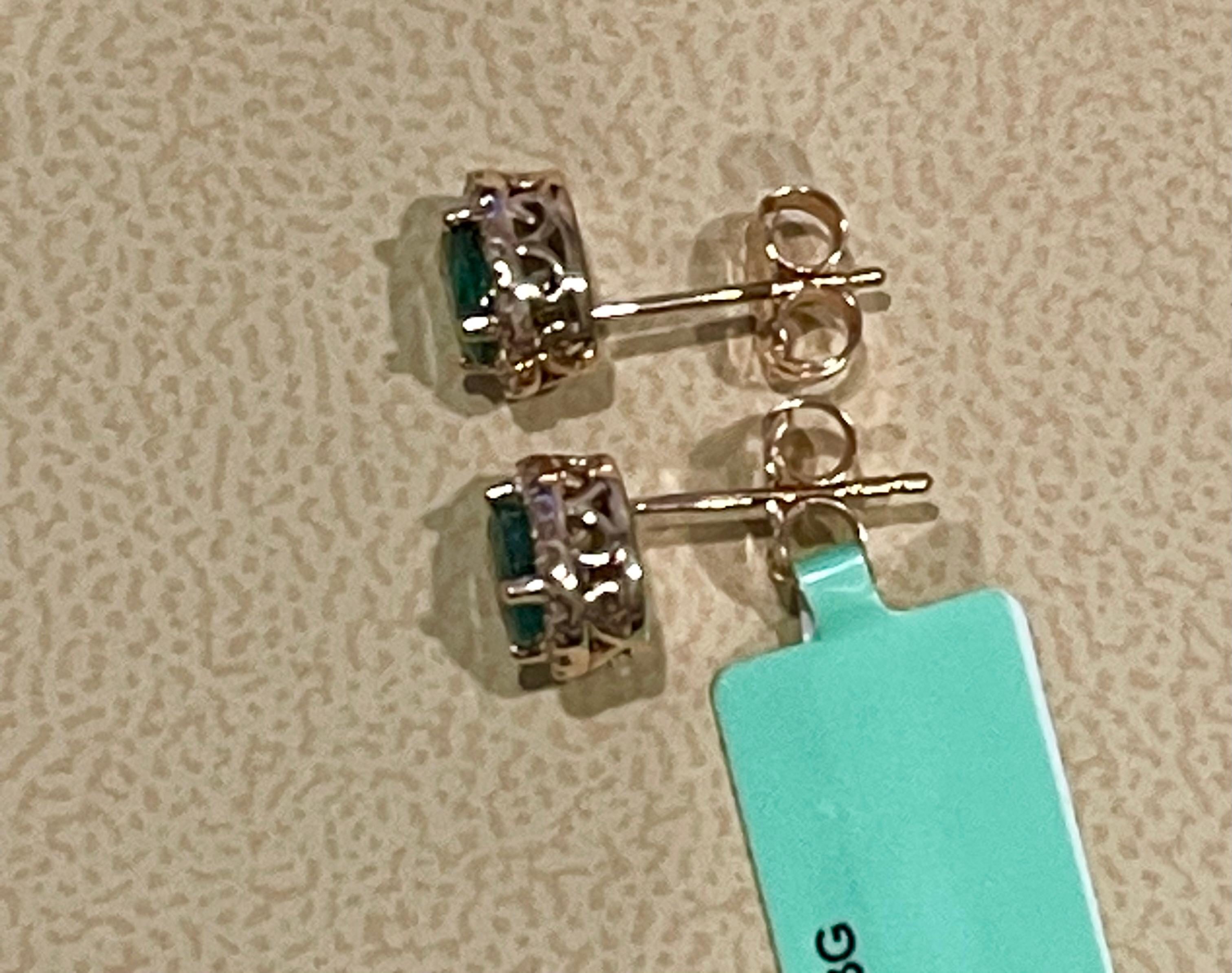 Oval Cut 1 Carat Oval Natural Emerald and Diamond Stud Post Earrings 14 Karat Yellow Gold