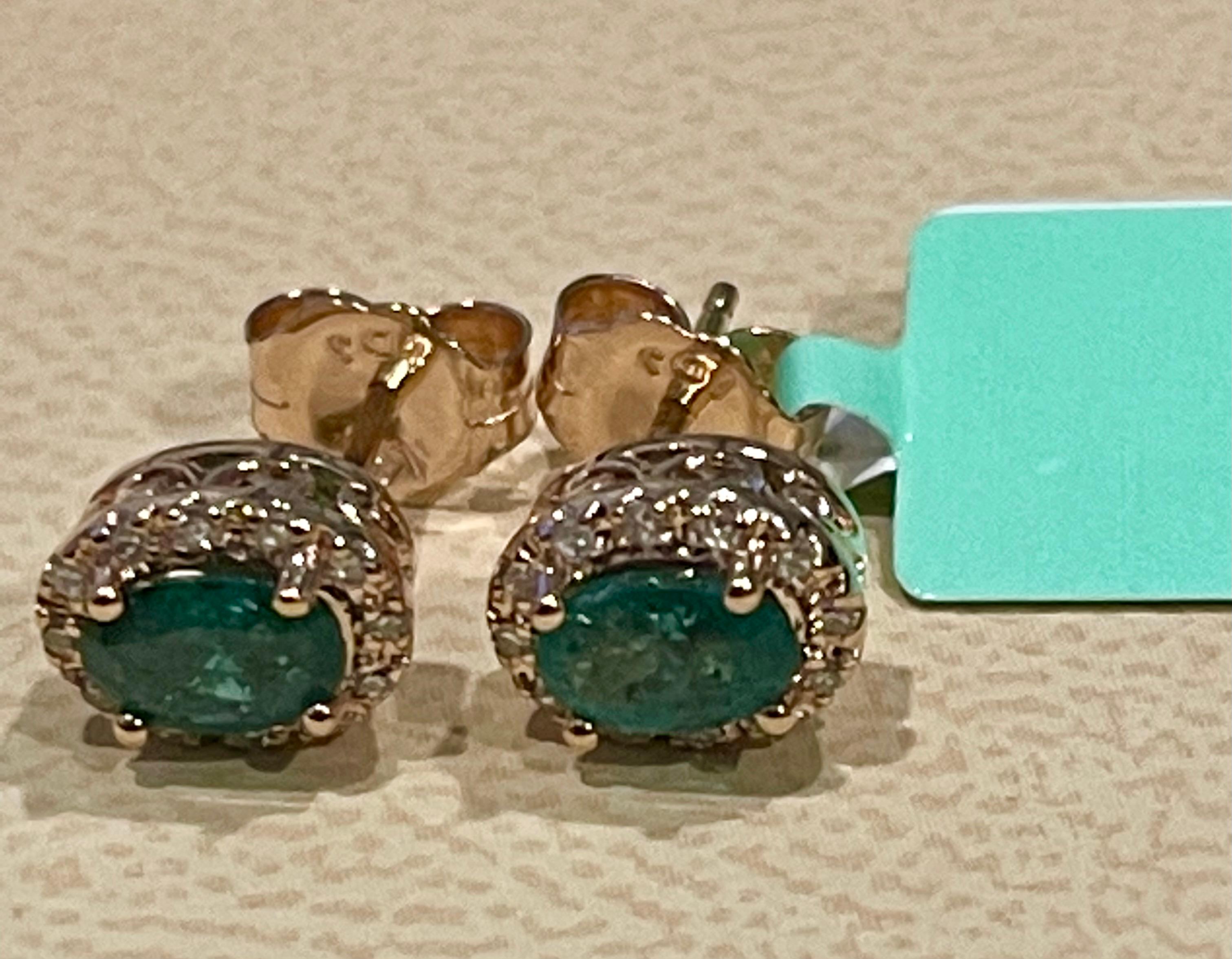 Women's 1 Carat Oval Natural Emerald and Diamond Stud Post Earrings 14 Karat Yellow Gold