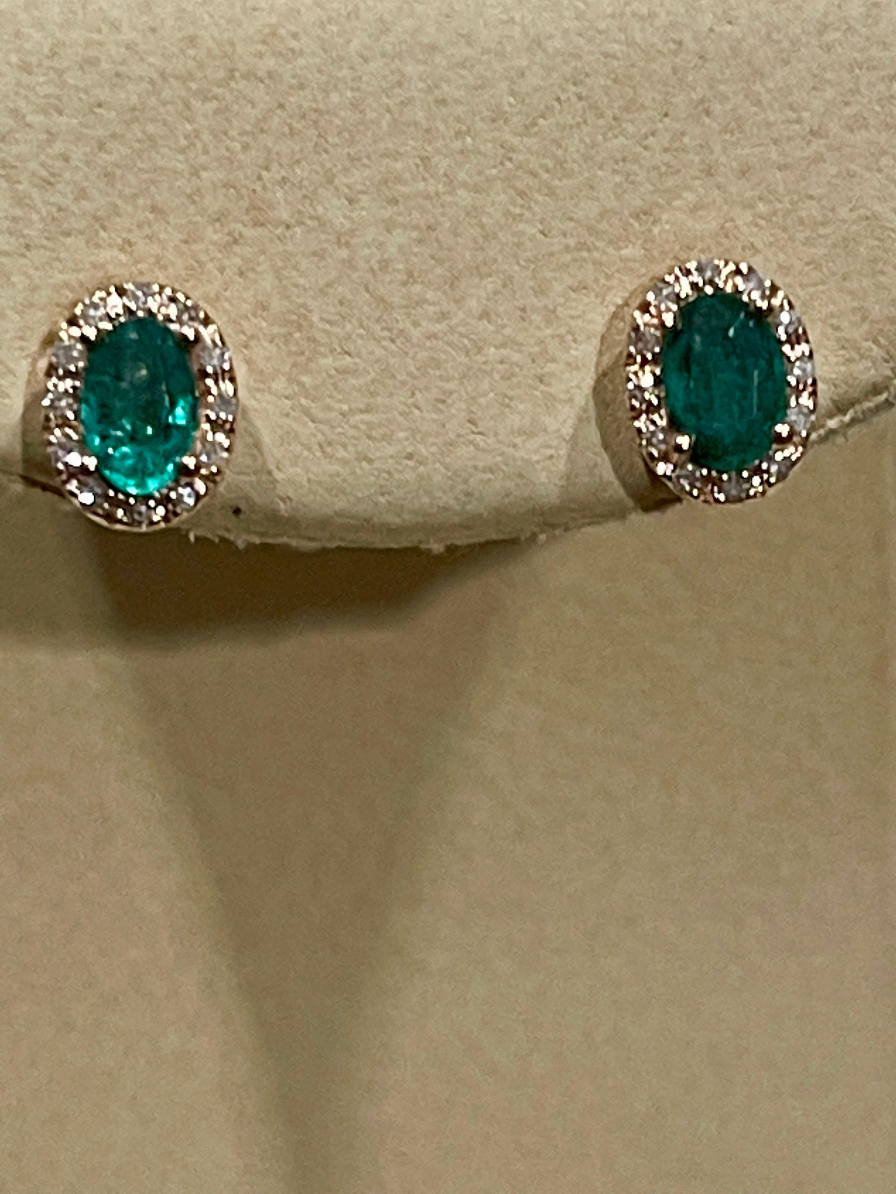 1 Carat Oval Natural Emerald and Diamond Stud Post Earrings 14 Karat Yellow Gold 1