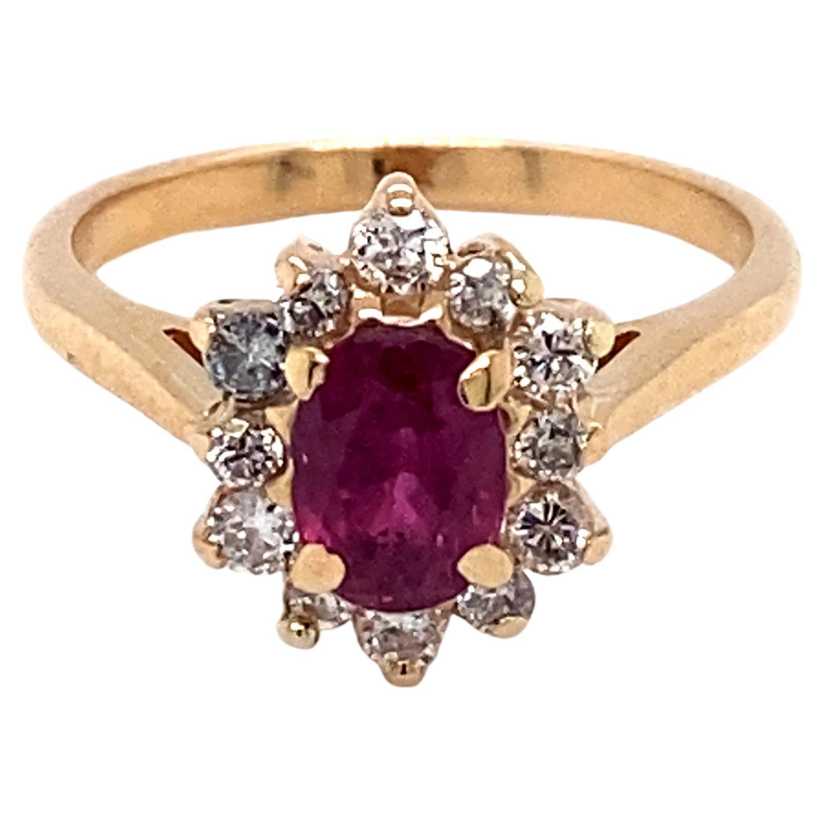 1 Carat Oval Ruby and Diamond Ring in 14 Karat Gold