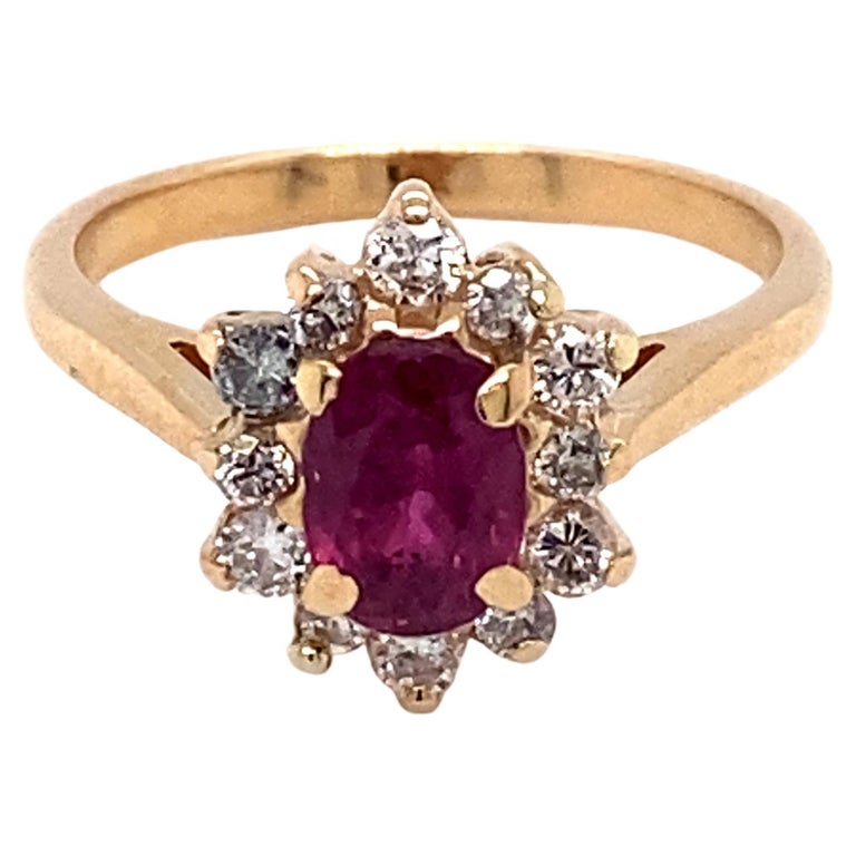 1 Carat Oval Ruby and Diamond Ring in 14 Karat Gold For Sale