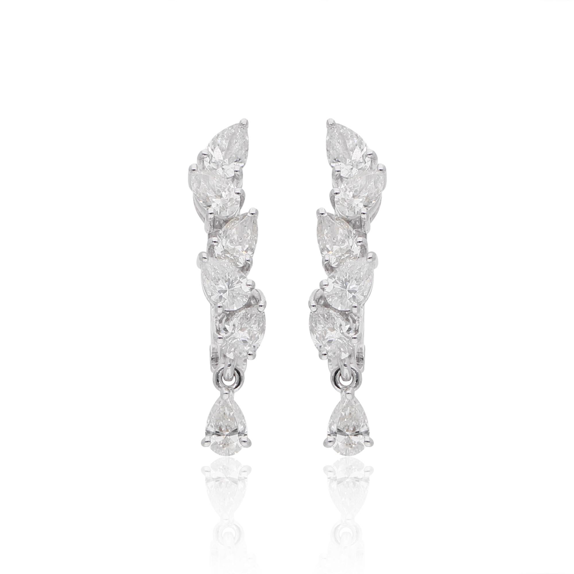 Step into the realm of timeless elegance with these breathtaking 1 Carat Pear Shape Diamond Hoop Earrings, meticulously handcrafted in luxurious 14 Karat White Gold. This exquisite pair of handmade jewelry is a radiant celebration of sophistication