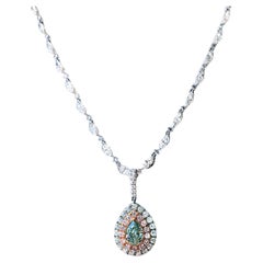 1 Carat Pear Shaped Fancy Light Yellowish Green Diamond Pendant In Platinum GIA