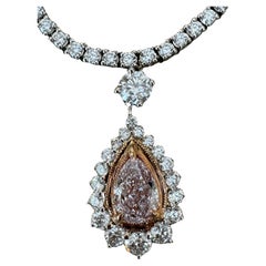 1 Carat Pear Shaped Natural Pink Diamond Halo Pendant in 18K Gold GIA.