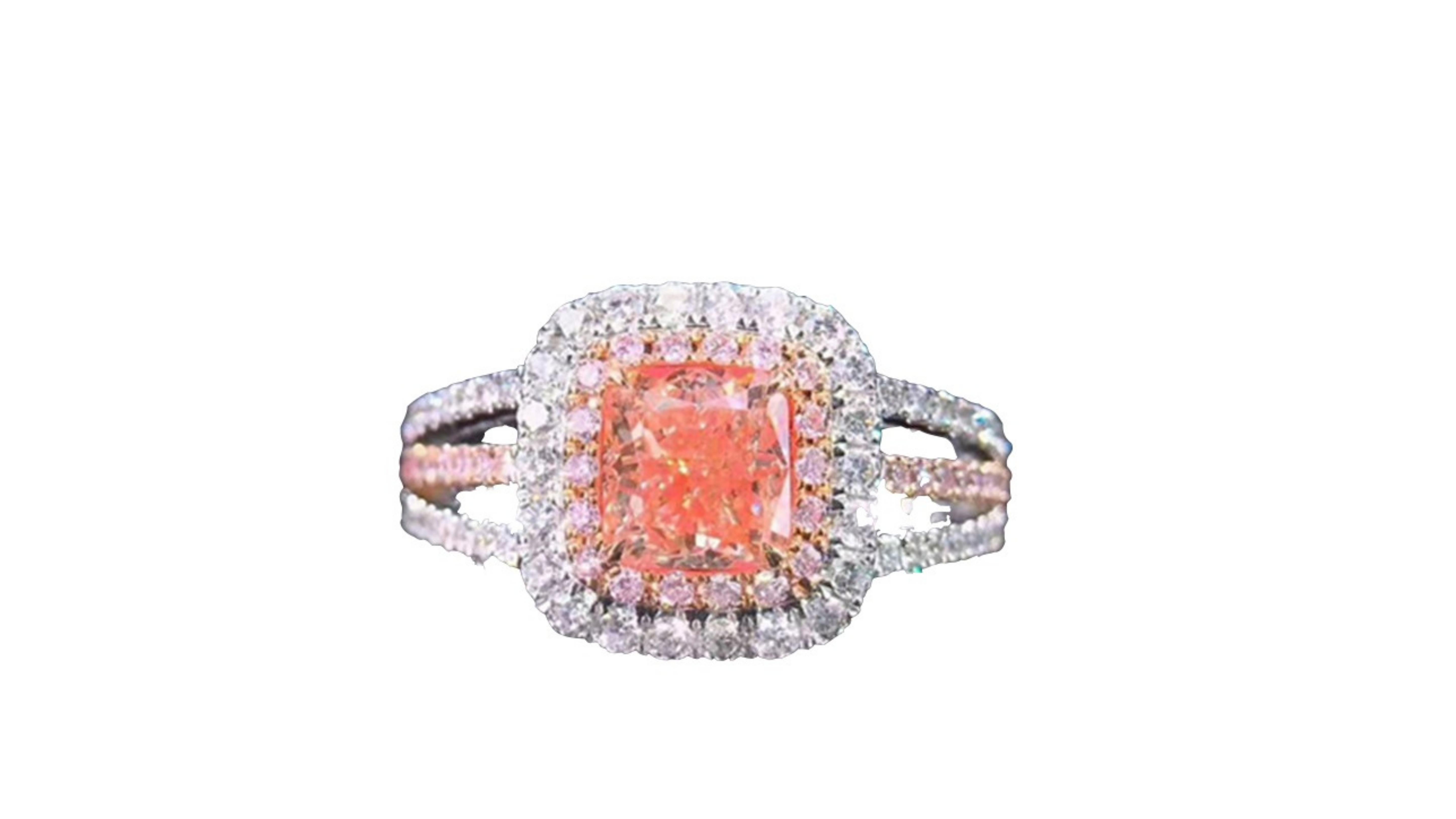 
1 Carat Pink Diamond Ring 18 Karat White Gold stand out in this design with 73  diamonds inc ones on each side of  the  band which is a triple split band.  It has small pink diamonds around the centre stone too. 


Only less than 0.1% of the