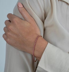 Bracciale tennis con zaffiro rosa taglio rotondo da 1 carato con incastonatura a forchetta in oro rosa 14Kt