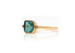 1 Carat Radiant Cut Emerald with Diamonds 18 Karat Yellow Gold Ring