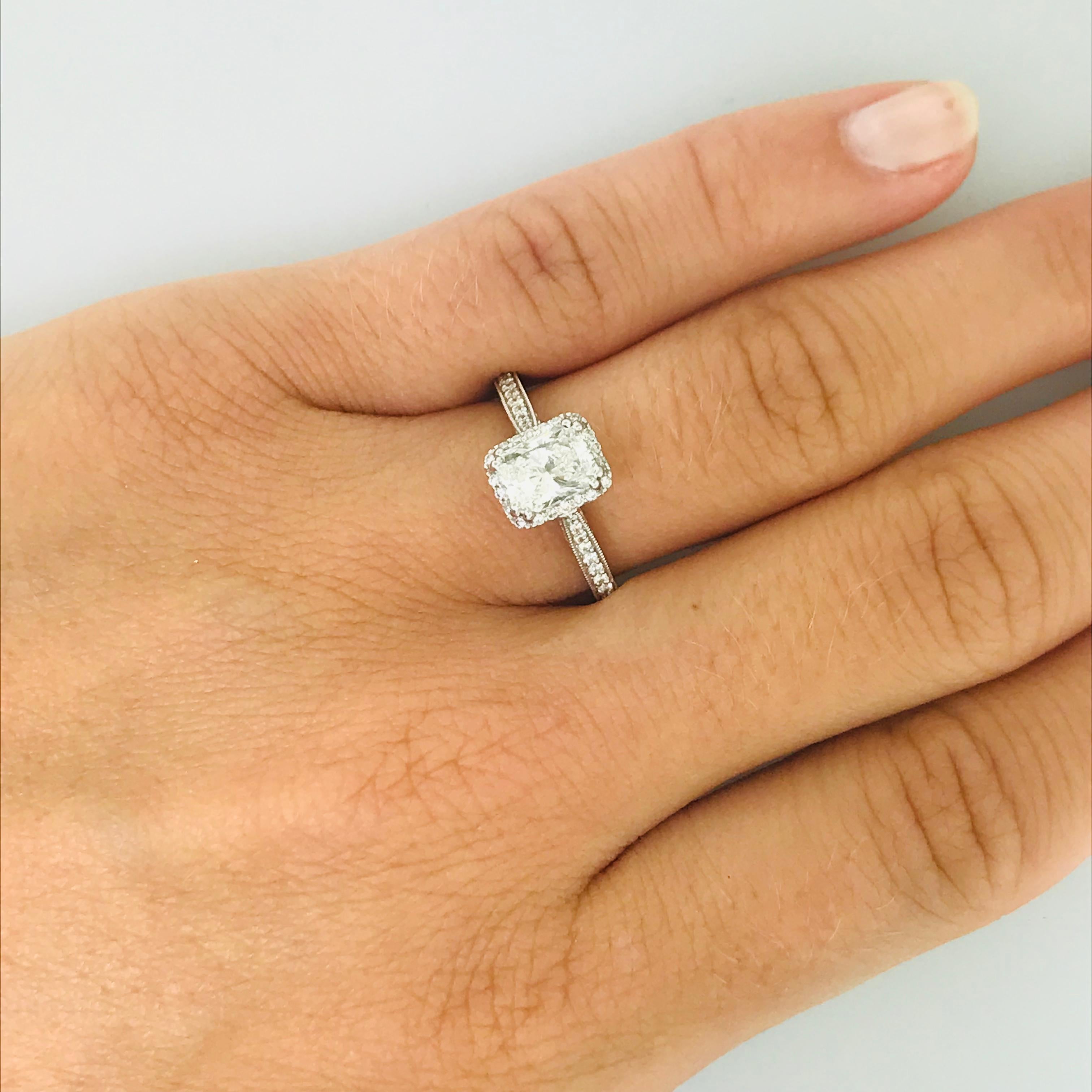 Everlasting Classic Radiant Diamond Engagement Ring

A RADIANT DIAMOND engagement ring for a radiant bride. This custom made ring was designed and created by Five Star Jewelry. With a radiant diamond set in 19 karat white gold this diamond shine