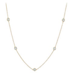 Collana con diamanti rotondi da 1 carato in oro giallo da 14 carati