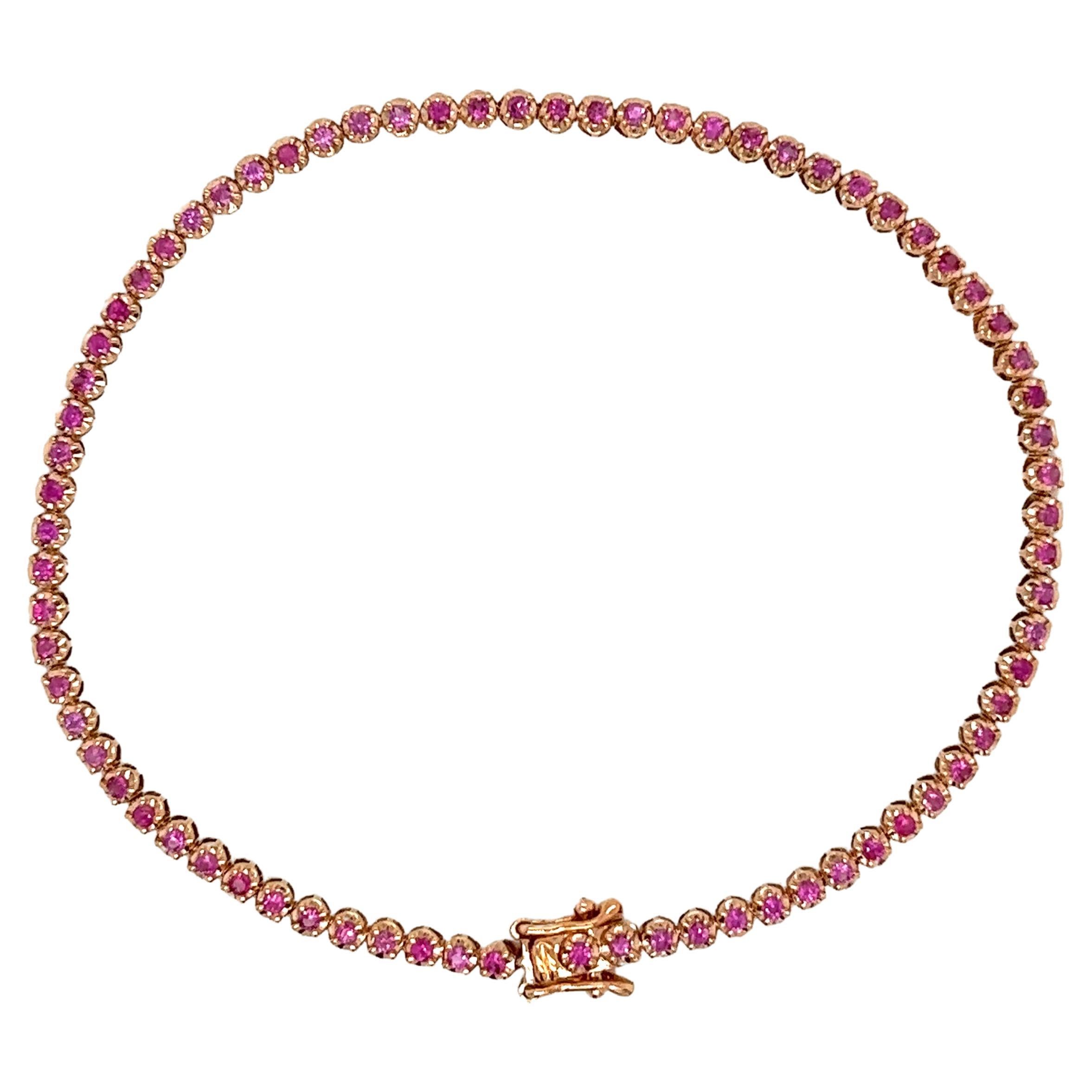 Bracelet tennis en or rose 14 carats avec saphir rose taille ronde serti à la broche de 1 carat