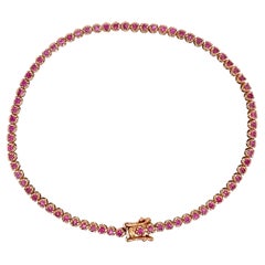 Bracelet tennis en or rose 14 carats avec saphir rose taille ronde serti à la broche de 1 carat