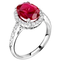 1 Carat Ruby and Diamond Bespoke Halo Ring in Platinum