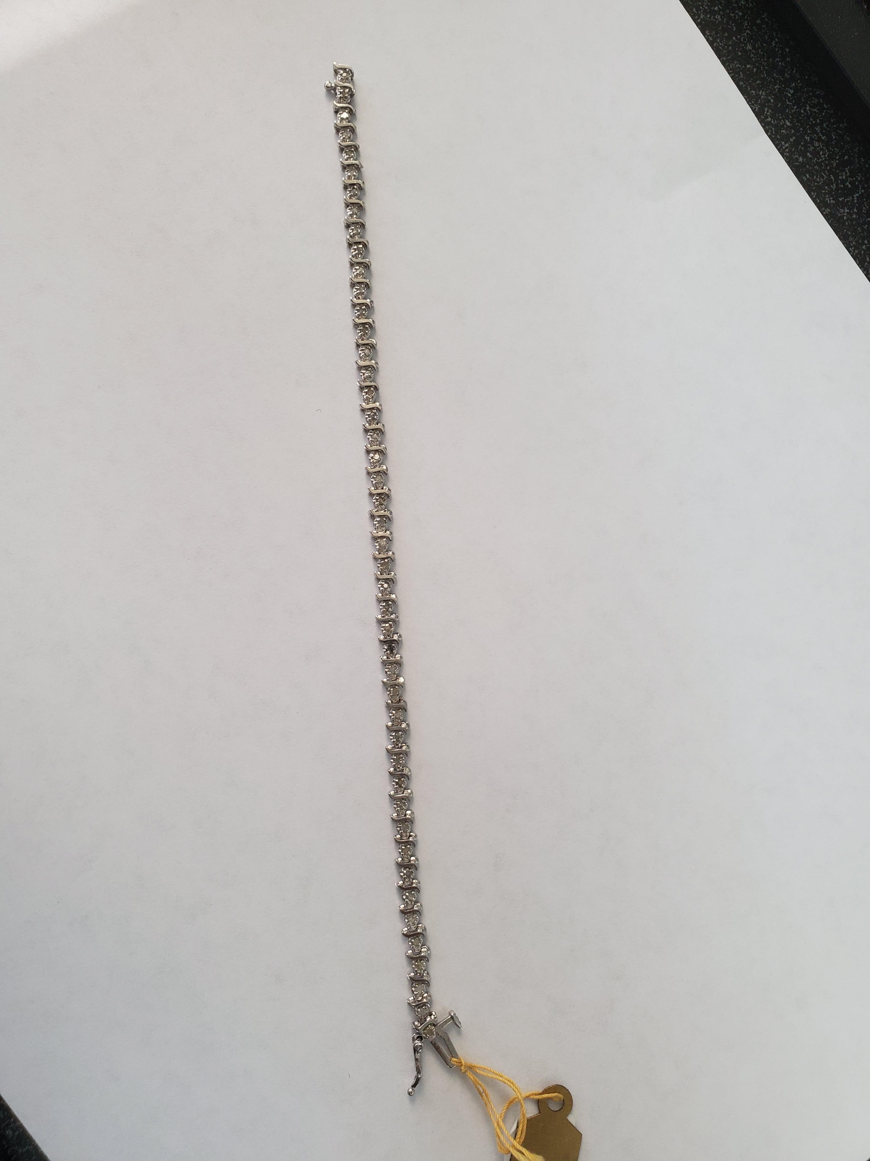 Pulsera de tenis con diamantes estilo S de 1 quilate y oro blanco de 10k en Nuevo estado para la venta en Sugar Land, TX