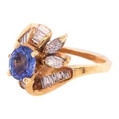 1 Carat Tanzanite and .70 Carat Diamond Estate Ring, 14 Karat Yellow Gold