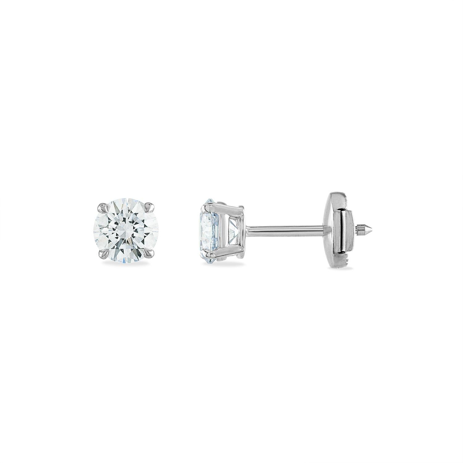 1.00 Ct Total weight Diamond stud earrings.
Both diamonds are GIA Certified, I color, SI2 Clarity. 
Both stones are rated Excellent Cut, Excellent Polish, and Excellent Symmetry - the highest possible score within the GIA grading evaluation. 

Set