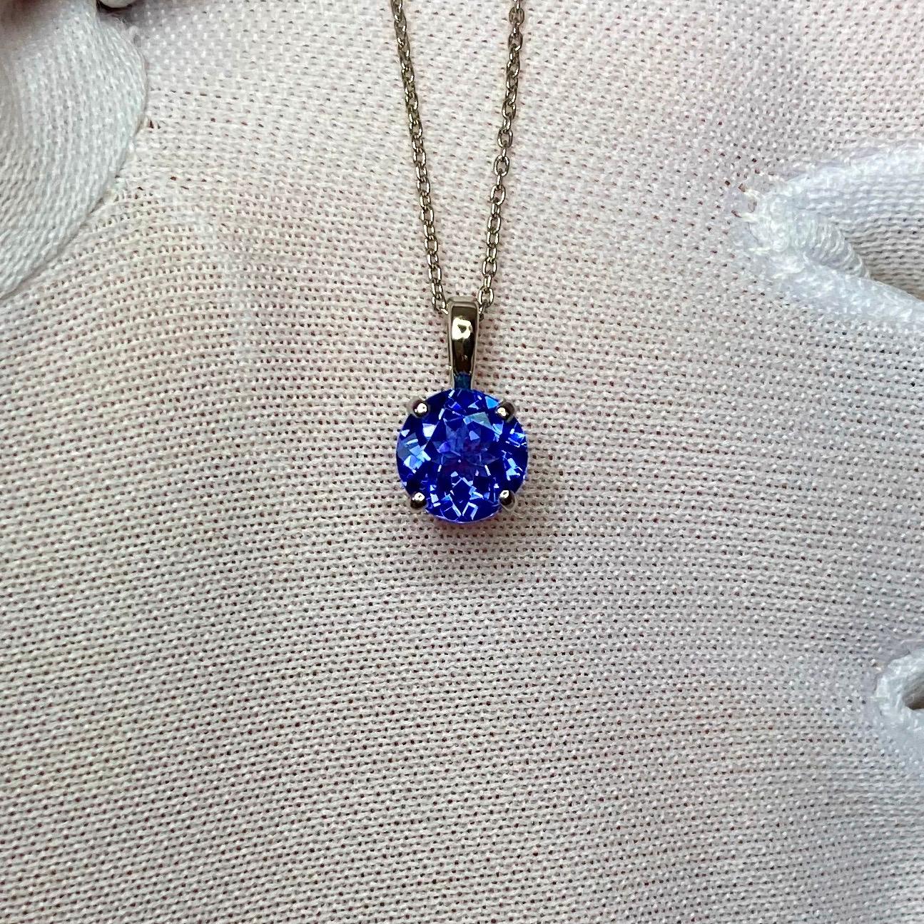 Stunning Vivid Blue Violet Natural Tanzanite Solitaire Pendant. 

1.00 carat stone with vivid blue violet colour and excellent clarity, very clean stone with only some small natural inclusions visible when looking closely. Set in a fine 950 Platinum
