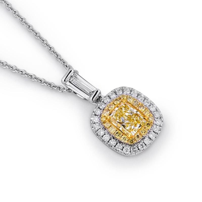 Clarity: VS 
Metal: White Gold
Main Stone: Yellow Diamond 0.58ctw
Side Stone Weight: Diamonds 0.43ctw
Total Diamond Carat Weight: 1.1ctw
