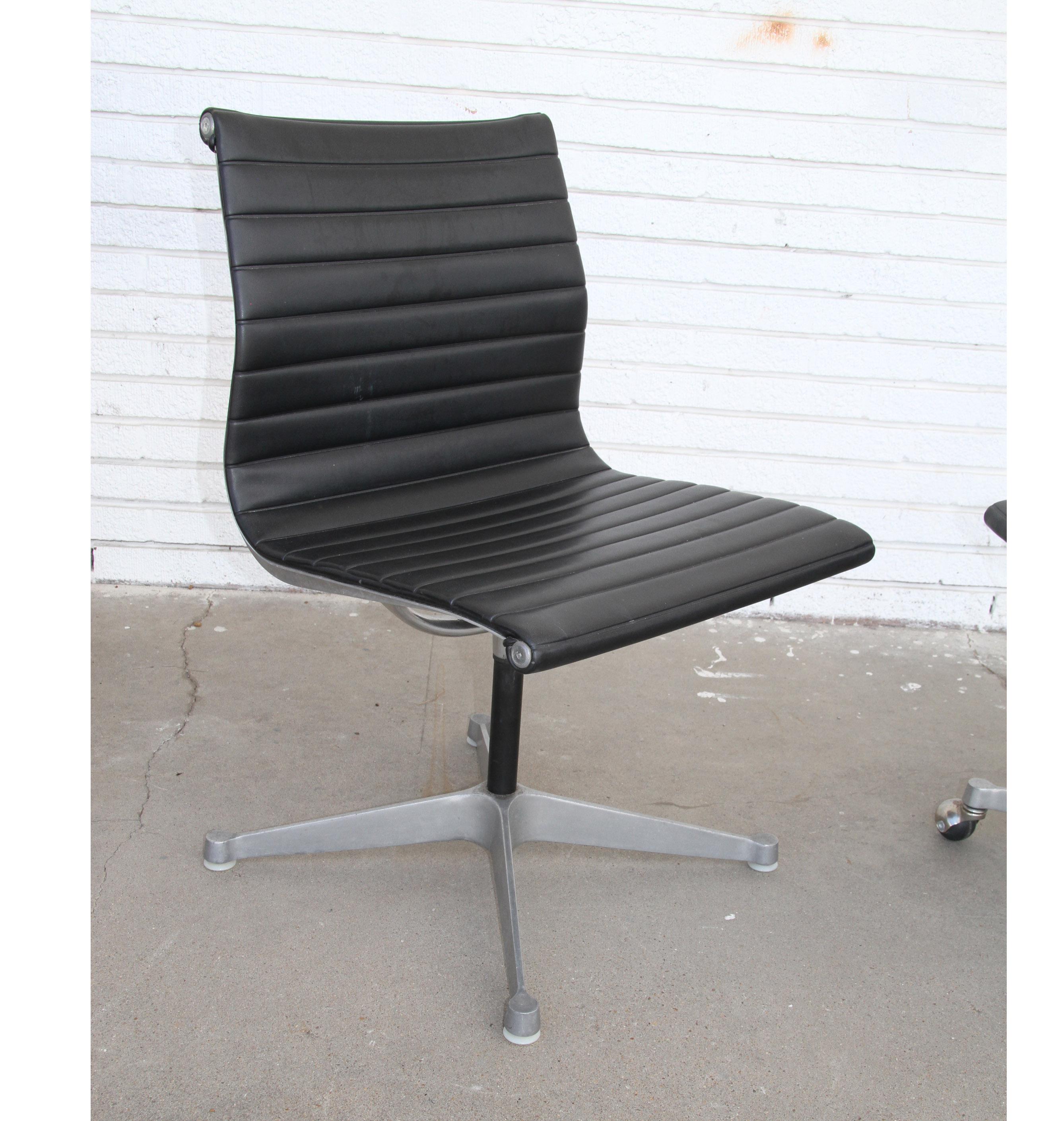 1 charles Eames Herman Miller Aluminum group chair
1970s

Charles and Ray Eames aluminum group side chair, EA330 office conference chair in black vinyl upholstery. The chair features a low-back with a lightweight aluminum frame and suspended