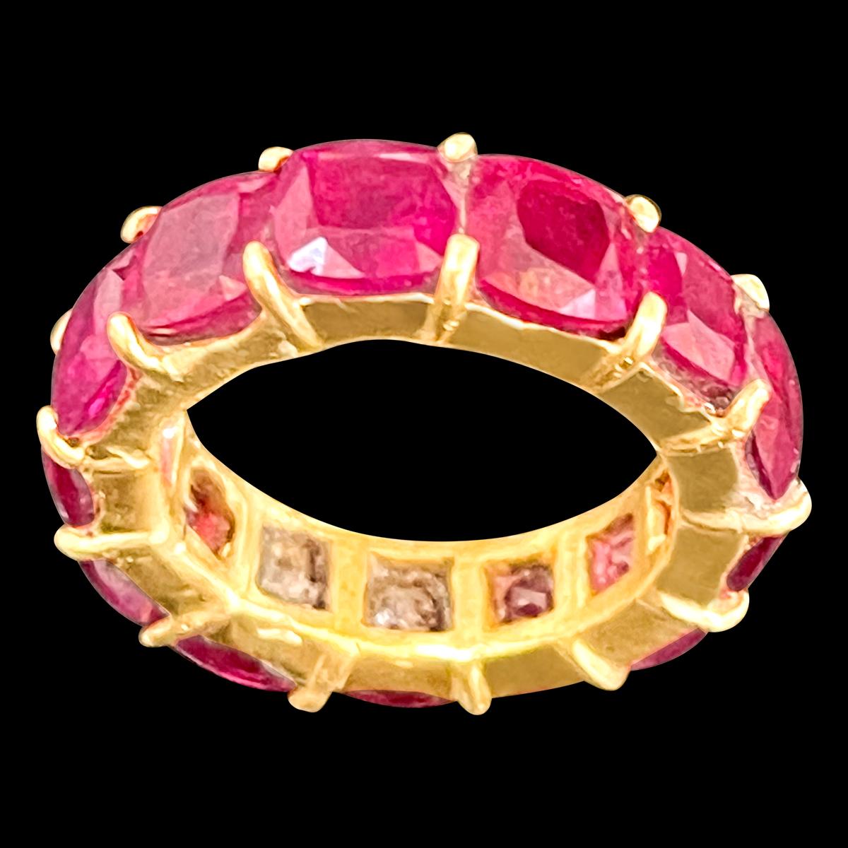 Hand Made ring
1 Ct Each Cushion Shape Treated Ruby  13 Ct Anniversary Eternity Band/Ring 18KYG
Eternity ring set all around with matching Ruby   solid 18 Karat Yellow Gold 
6 mm Wide band , Thickness 4.2mm
This eternity band features 13  Cushion