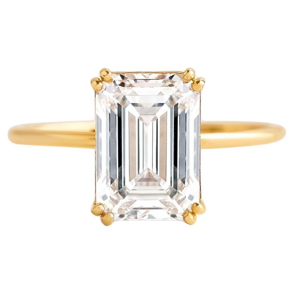 For Sale:  1 ct Emerald cut moissanite 14k gold ring.