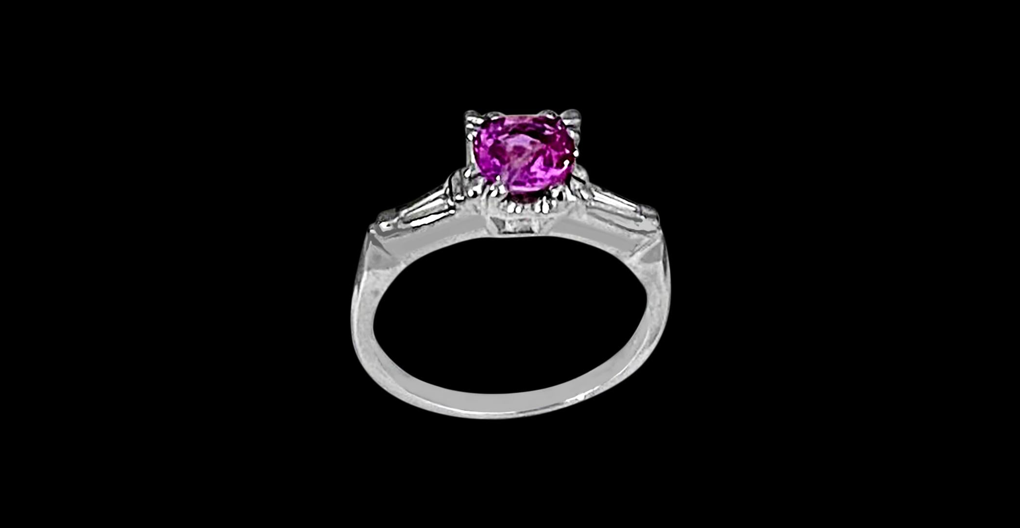 A classic, Ring 
weight of 1 Ct natural Pink sapphire and two Baguettes  Diamond  Ring made in platinum
1 diamond Baguette on each side of the pink sapphire.
Natural Pink Sapphire in  Round  shape , Pretty color, luster is amazing and  have very