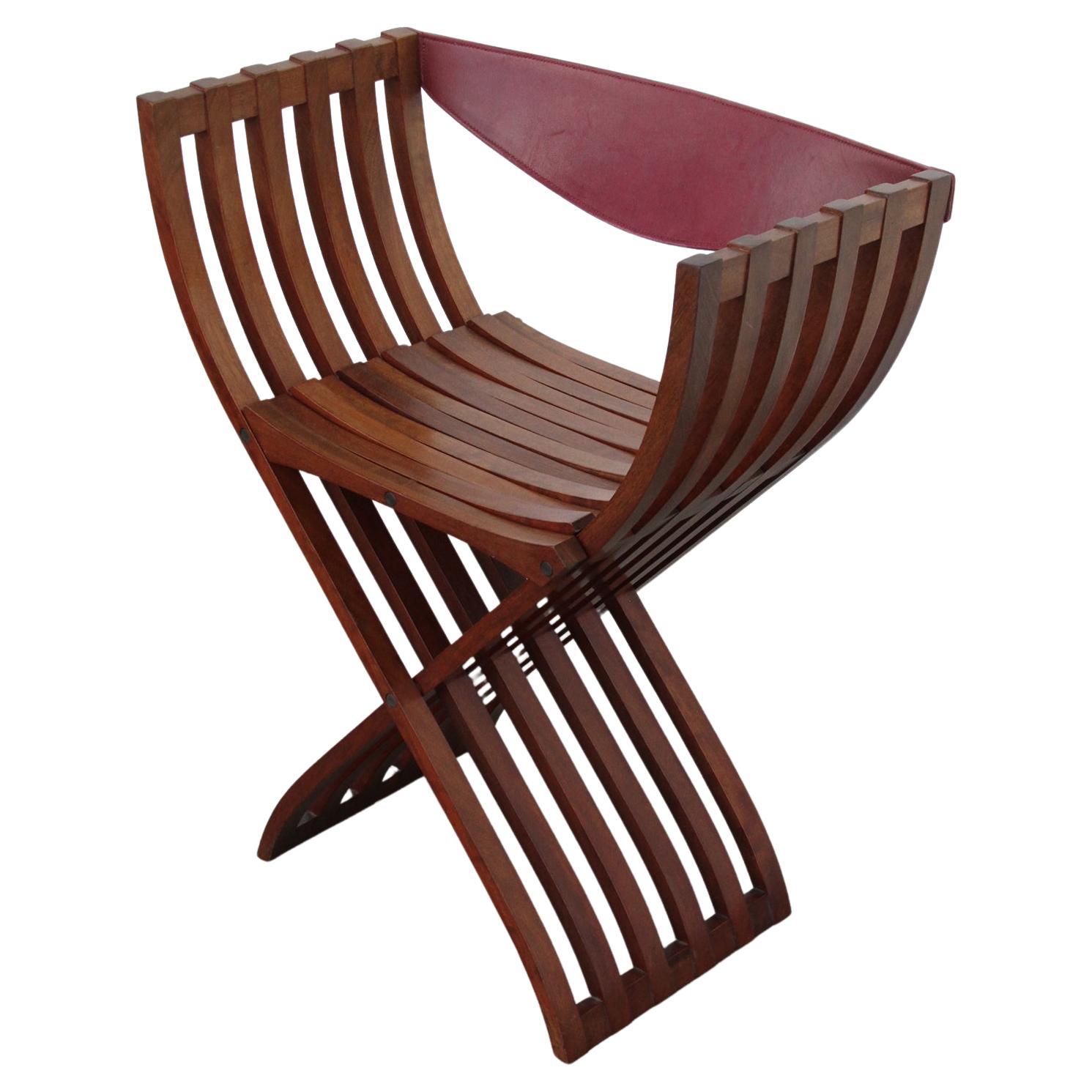 1 Chaise Curule dans le style de Pierre Paulin